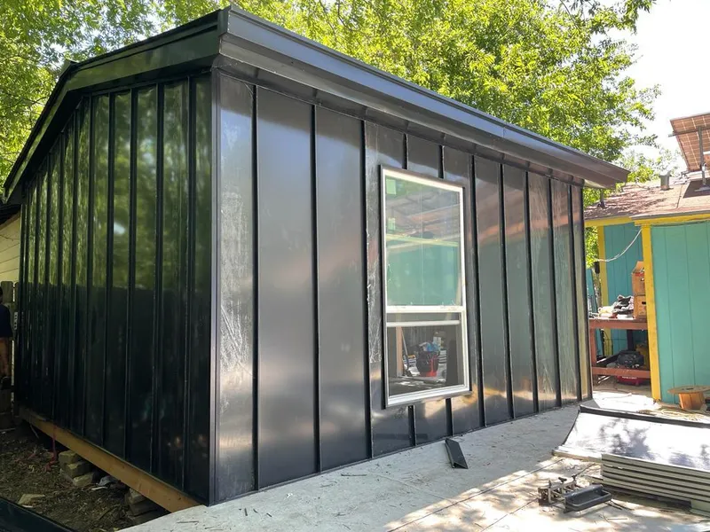 Black standing seam metal wall panels for Roof Inspection in Boylston